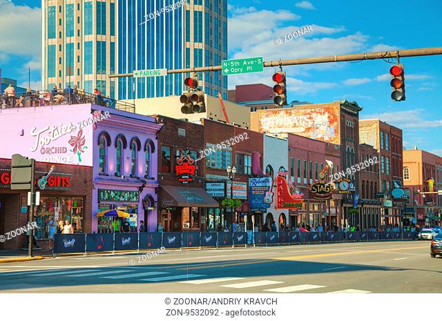 NASHVILLE - AUGUST 28: Downtown Nashville with people on August 28, 2015 in Nashville, TN. Nashville is the capital of the State of Tennessee and the county...
