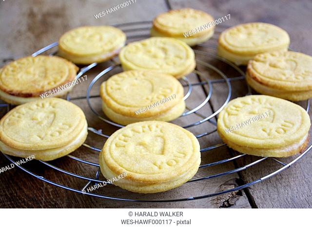 Lemon cookies on a cooling rack