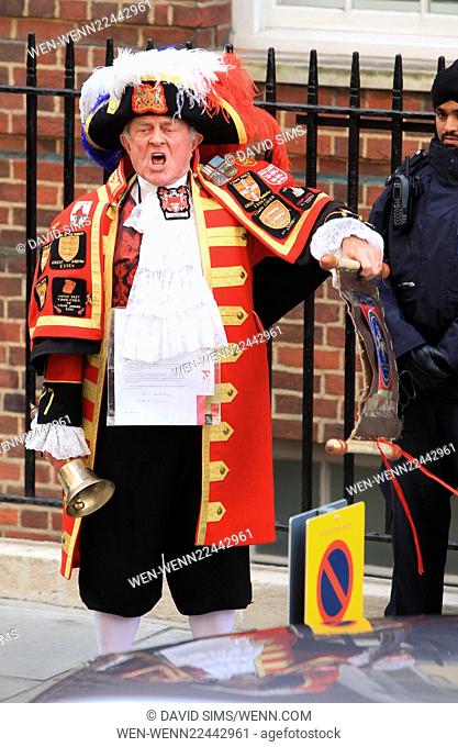 The town crier announces the birth of the new royal baby outside St. Mary's Hospital. Catherine, The Duchess of Cambridge and Prince William are new parents...