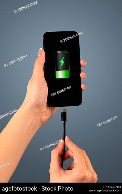 Elegant hand charging cellphone with low battery
