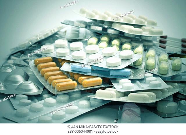 Pile of medical supplies, pills, capsules and tablets