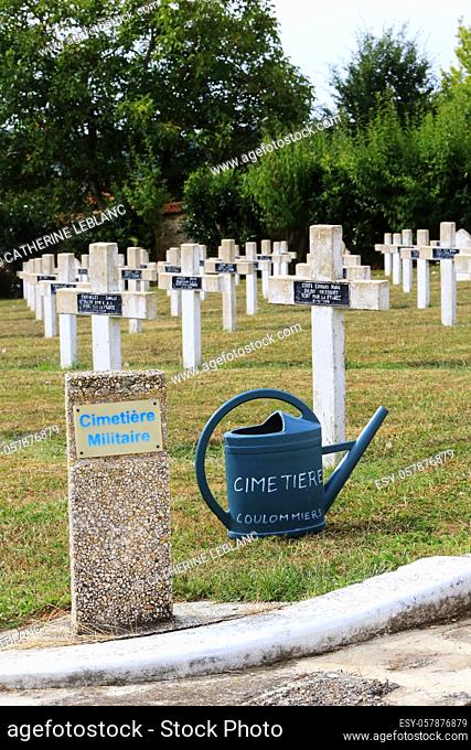 Bollard and watering can. Commonweatlth war Graves. French military cemetery comprising 328 graves of Columeriens, English