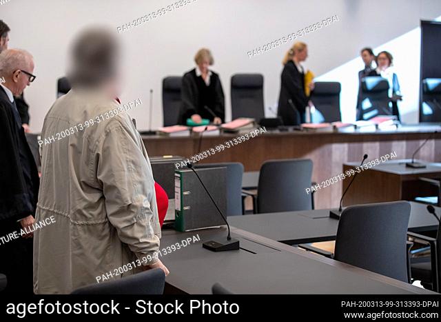 13 March 2020, Bavaria, Nuremberg: A man accused of murder is about to begin his trial in the courtroom of the Nuremberg-Fürth Regional Court