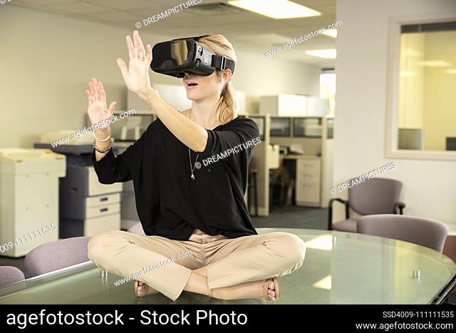 Young woman with a VR headset