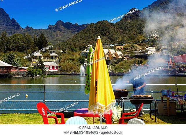 France, Ile de la Reunion (French overseas department), Cilaos, scene outdoor, barbecue next to a body of water on mountain background