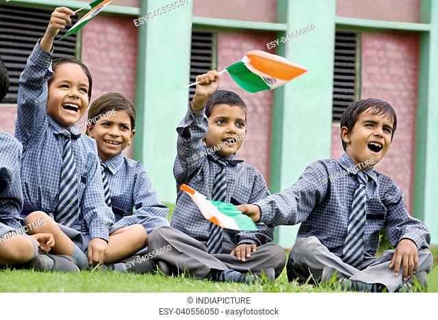 School kids holding the Indian flag