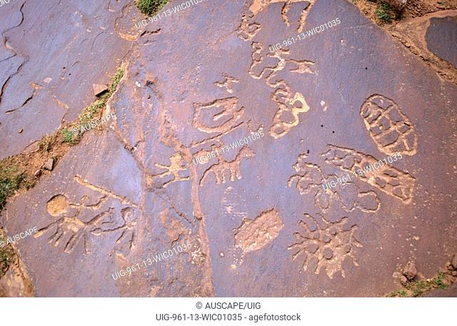 Neolithic engravings created by hunter-gatherers following herds that sought feeding grounds in the mountains, Yagour Plateau, Tadla-Azilal