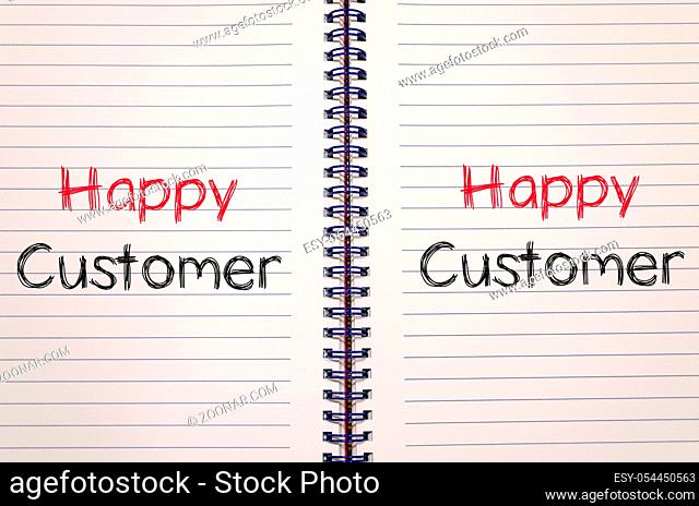 Happy customer text concept write on notebook