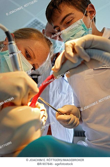 Students practice the extraction of a wisdom tooth on a dummy at the Zahnklinik der Eberhard-Karls-Universitaet or Dental Clinic of the Eberhard-Karl University...