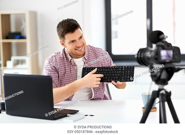 male video blogger with keyboard videoblogging