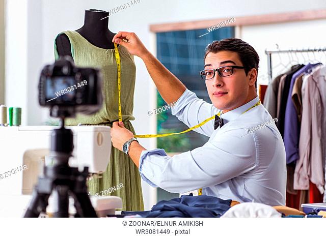 Young man working as fashion video blogger