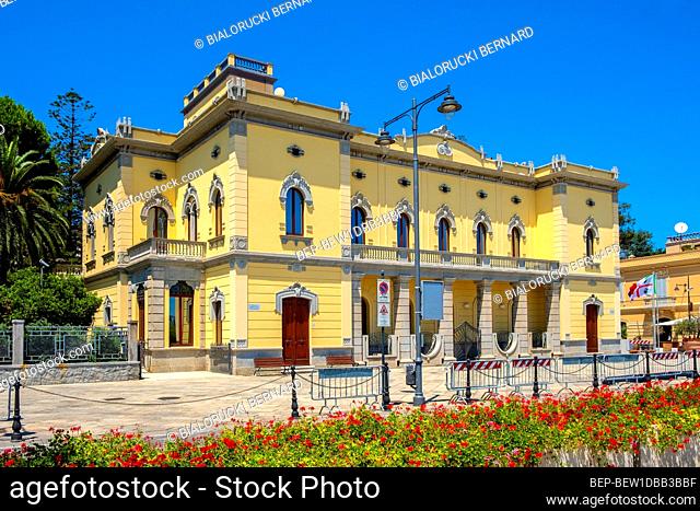 Olbia, Sardinia / Italy - 2019/07/21: Citi hall building - Municipio di Olbia - at the Corso Umberto I street - main boulevard and touristic site of the...