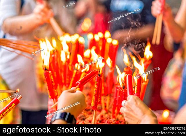 The burning incense and candle worship in Buddhism