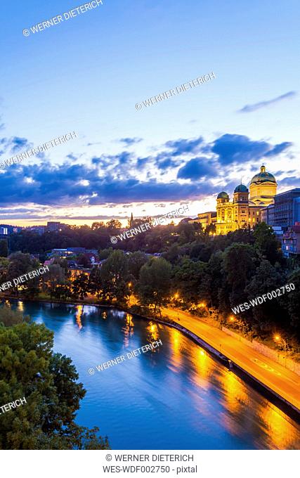 Switzerland, Bern, cityscape with Federal Palace and River Aare in the evening