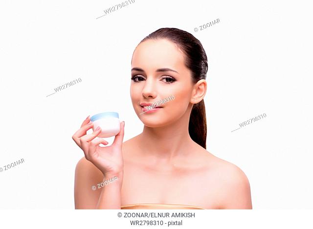 Young woman with cream isolated on white