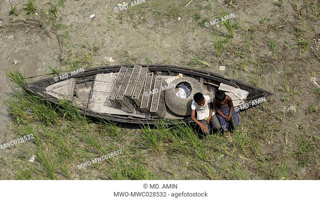 Rural children on the boat. Bangladesh. 2015