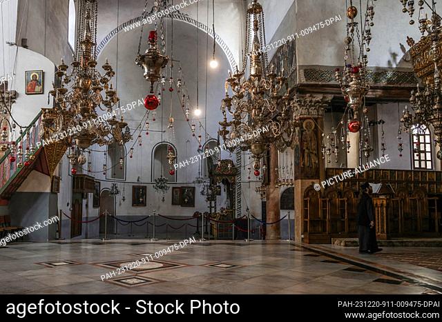 20 December 2023, Palestinian Territories, Bethlehem: An interior view of the Church of the Nativity without any visitors after the Christmas celebrations were...