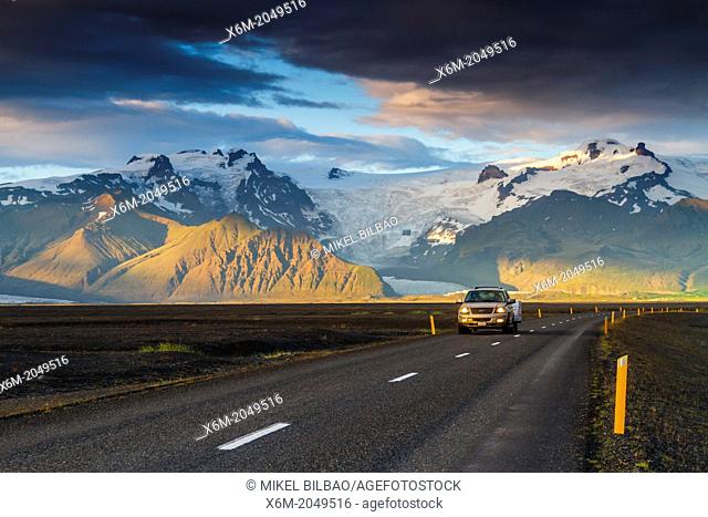 4WD vehicle crossing a mountain landscape in south Iceland, Europe