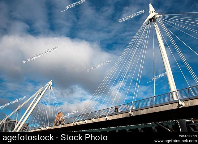 The famous historic Hungerford suspension Bridge crossing the river Thames in London city, United Kingdom