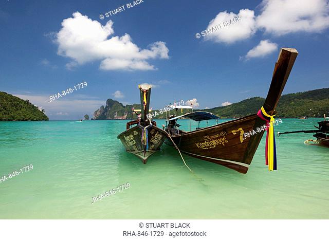 Long-tail boats in Ao Dalam bay, Koh Phi Phi, Krabi Province, Thailand, Southeast Asia, Asia