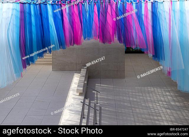 Colourful silk curtains at the CaixaForum, cultural centre in the former Fabrica Casaramona, Barcelona, Spain, Europe