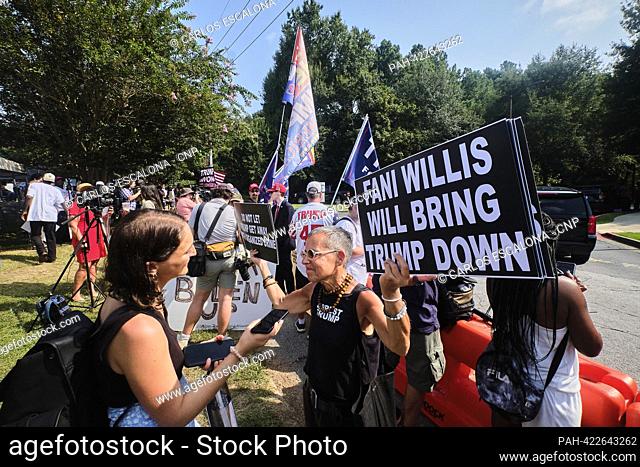 ATLANTA, GA. AUG 24 2023 - Opponents of former US President Donald J. Trump gather outside Fulton County Jail in Atlanta