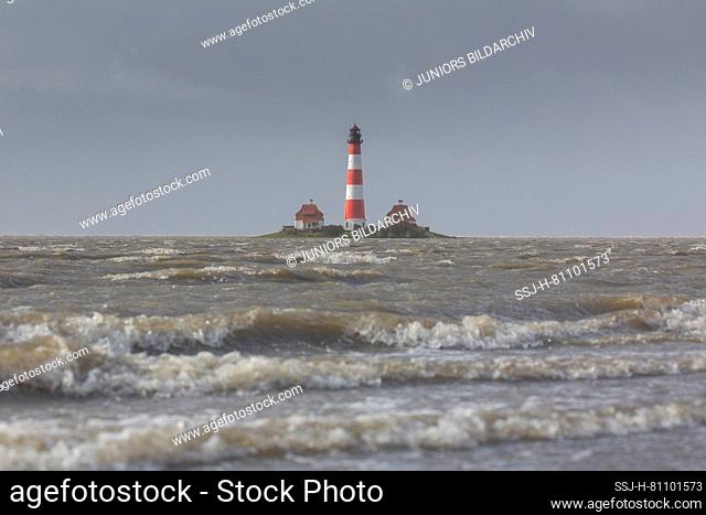The lighthouse Westerheversand at storm tide. Peninsula of Eiderstedt, North Frisia, Germany