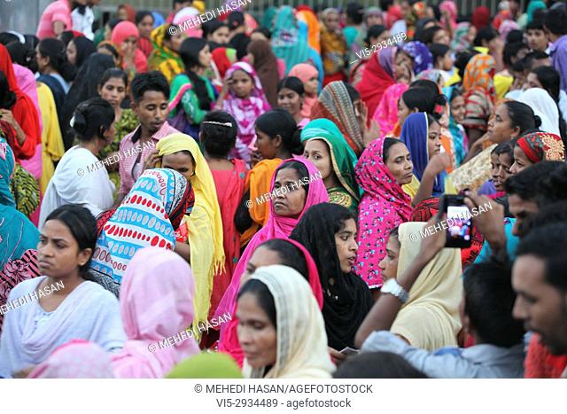 Bangladeshi garments workers attend a demonstration protest for their due salary and wages in front of National Press Club in Dhaka