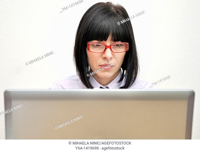 Young businesswoman using laptop