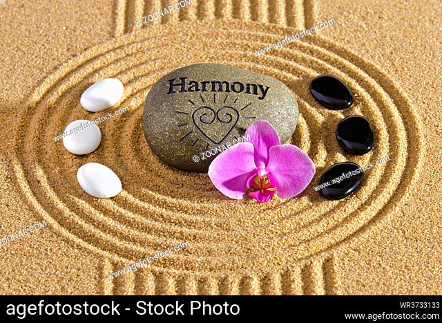 Japanese Zen garden of tranquility with stone in textured sand