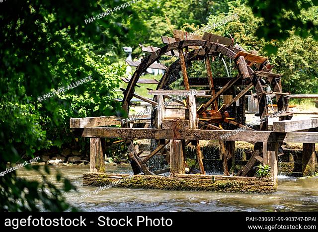 01 June 2023, Bavaria, Nuremberg: The water wheel at the Lederersteg at the Westbad turns with the flow of the Pegnitz. The wooden water wheels were first...