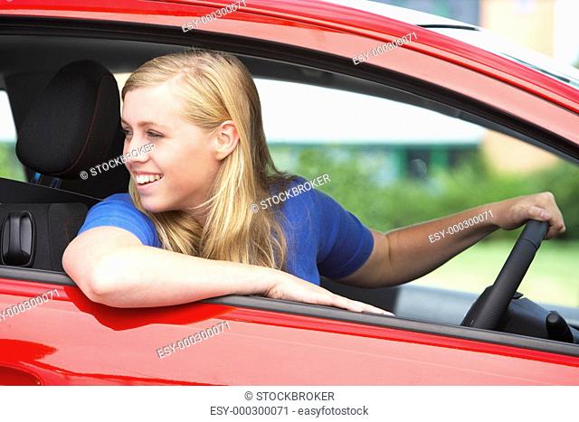 Teenage Girl Sitting In Car
