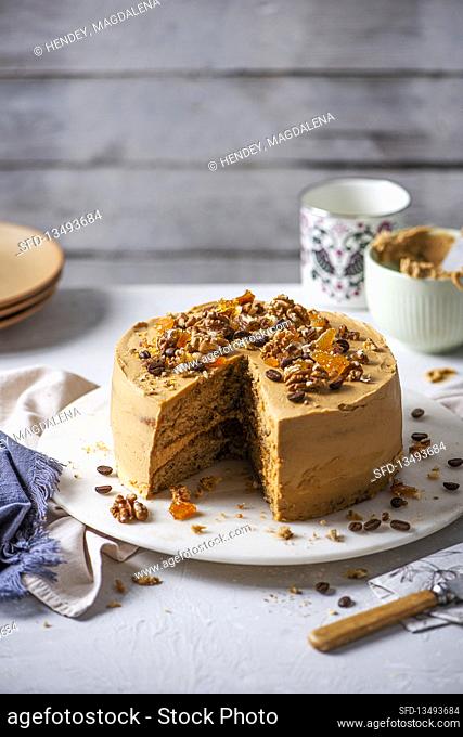 Coffee cake with walnuts, pecan praline and coffee butter icing