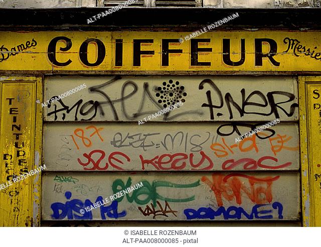 'Hairdresser' typography in French and graffiti