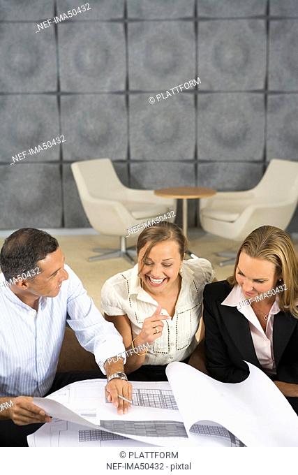 Smiling persons in an office, Sweden