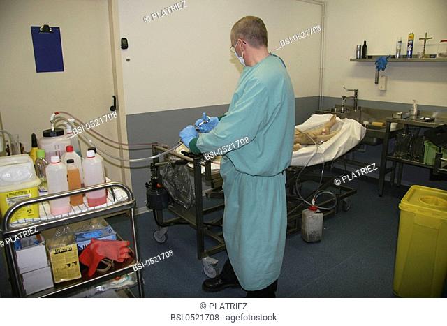 Photo essay from hospital. Photo essay at the Morlaix hospital, France. Preparation of a body