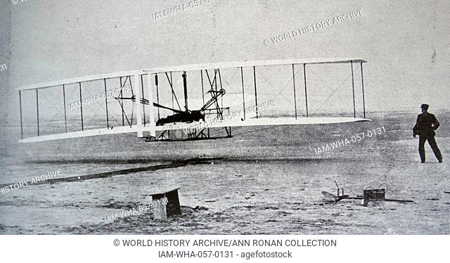 The Flyer makes a perfect take-off. Orville Wright, arranged that this photograph would be taken of the first controlled