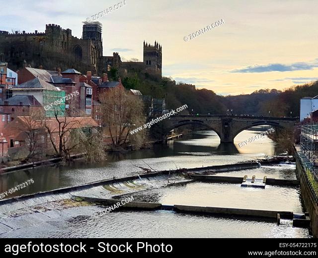 Durham Castle and Cathedral on a rock above the city, and Framwellgate Bridge spanning the River Wear, England, UK