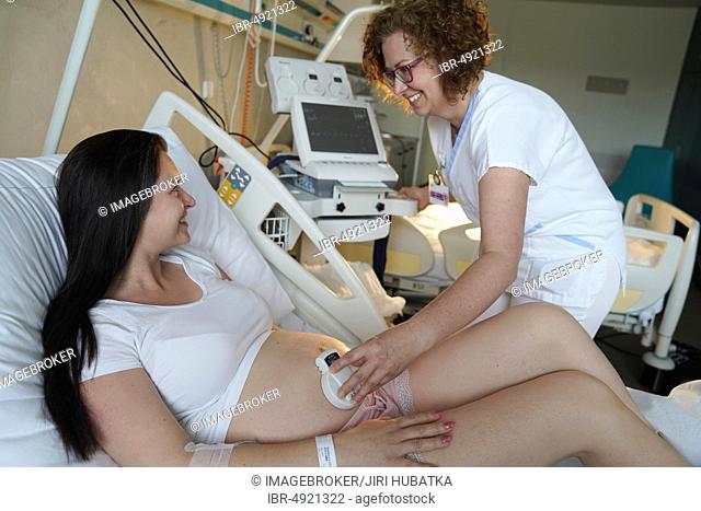 Nurse with patient at CTG, cardiotocography, examination, Karlovy Vary, Czech Republic, Europe