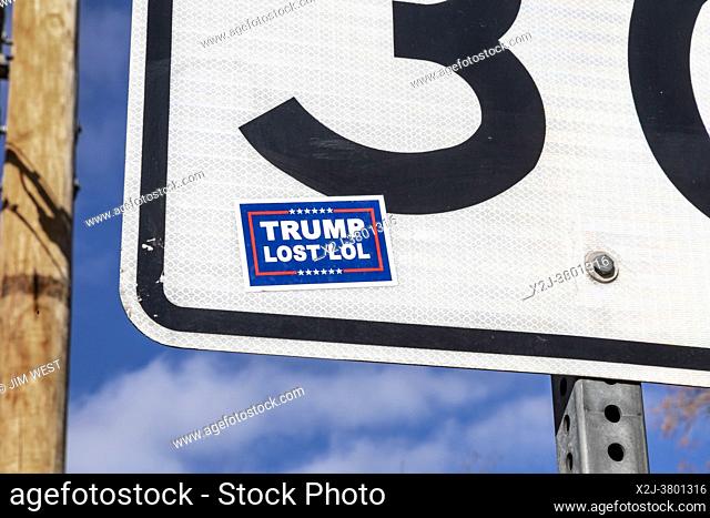 Wheat Ridge, Colorado - A sticker reading ""Trump Lost LOL"" on a traffic sign in a Denver suburb