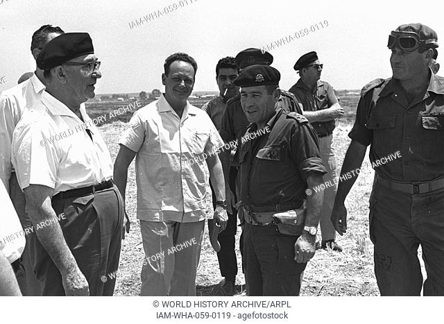 Israeli Prime Minister Levy Eshkol (left) and Yigal Allon (second from left) with Major General Israel Tal and Major General Yeshayahu Gavish in the Negev...