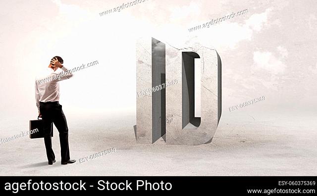 Rear view of a businessman standing in front of ID abbreviation, attention making concept