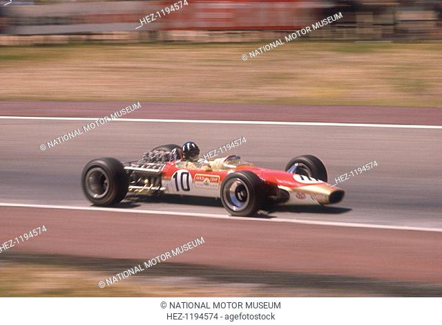 Graham Hill's Lotus at speed, Spanish Grand Prix, Jarama, Madrid, 1968. Hill won the race, the first of three victories in his second World Championship-winning...