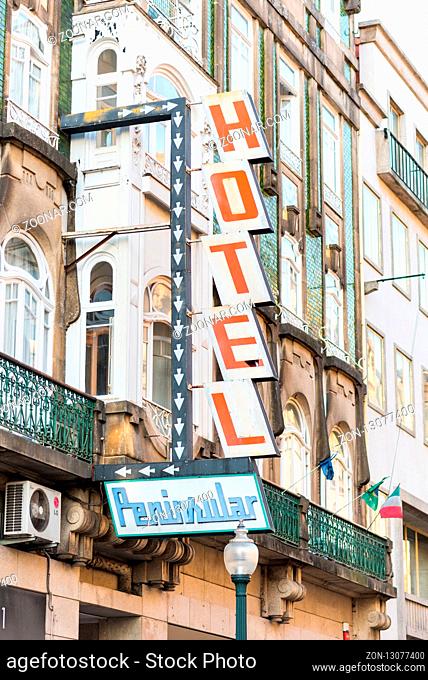 Old-fashioned hotel sign in the area around the station São Bento in Oporto