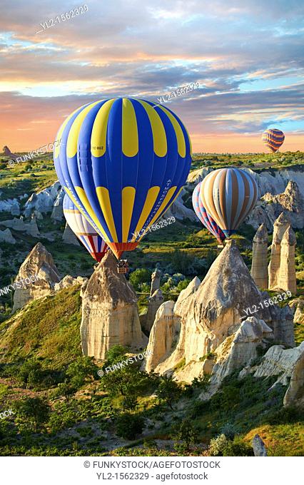 Hot Air Baloons over the Love Valley at sunrise , Cappadocia Turkey