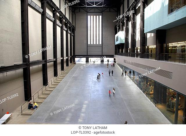 England, London, South Bank, Overlooking visitors in the Turbine Hall at the Tate Modern
