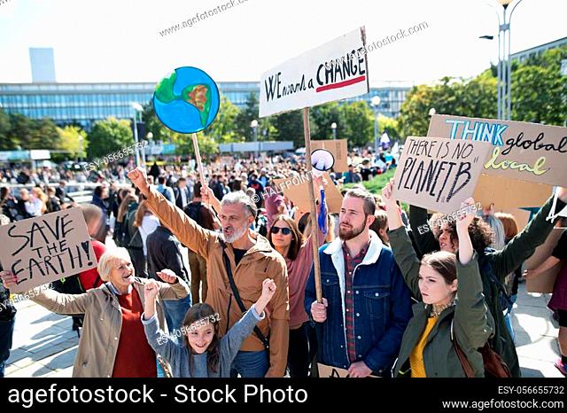 People with placards and posters on a global strike for climate change