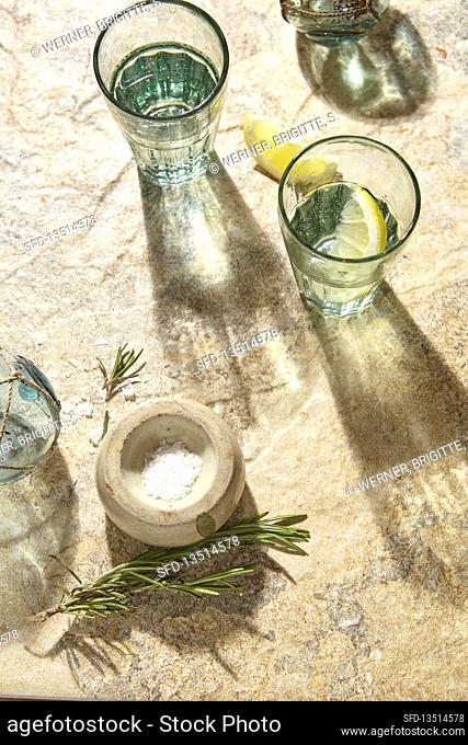 Water with lemon, Maldon salt flakes, rosemary