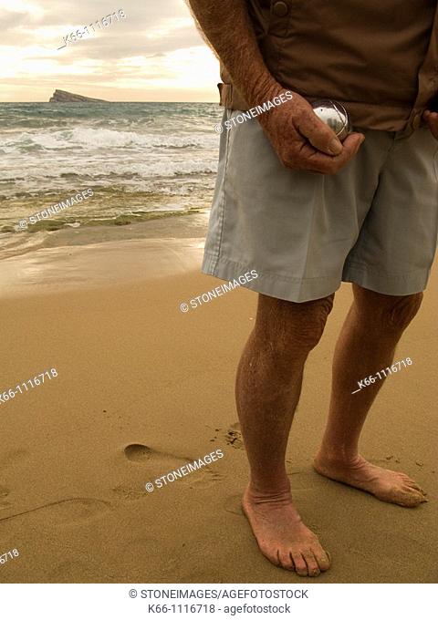 Old man on the beach