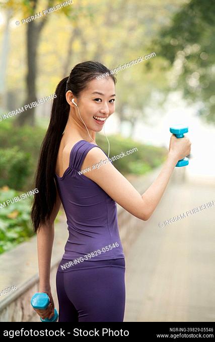 Young woman exercise in the park
